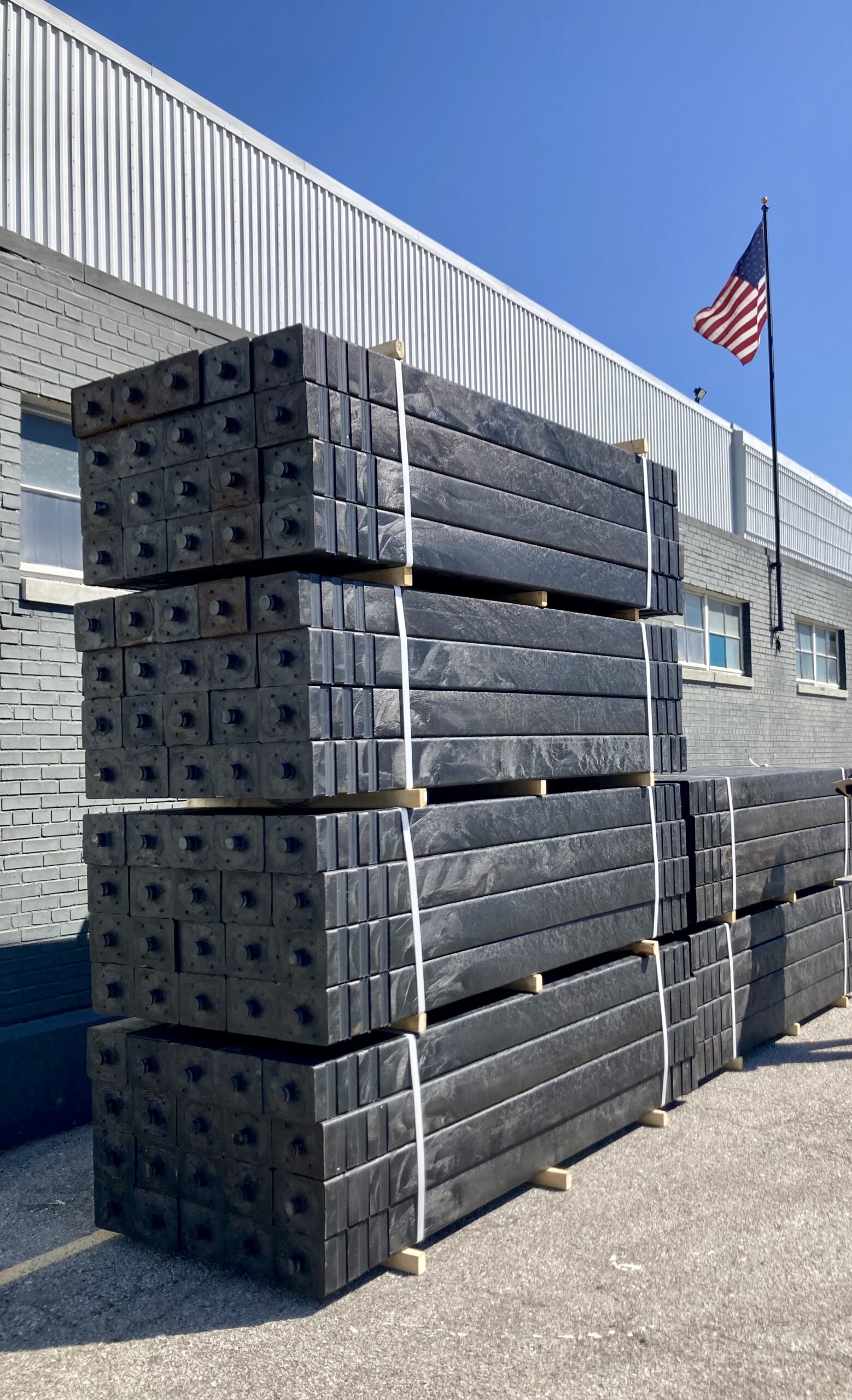 Triton Ties with Flag at Plant Stacks of Triton Ties at our St. Louis Facility